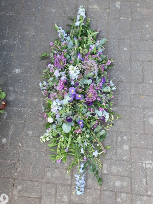 Country Style Casket Spray   Blues and Purples